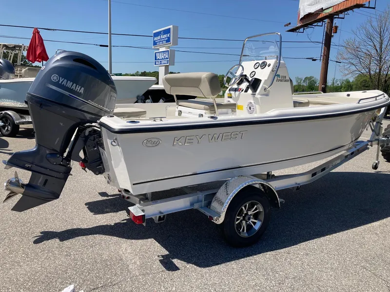 Slide: The Image of 2024 Key West 1720 Sportsman boat with Yamaha outboard motor on trailer. - 2