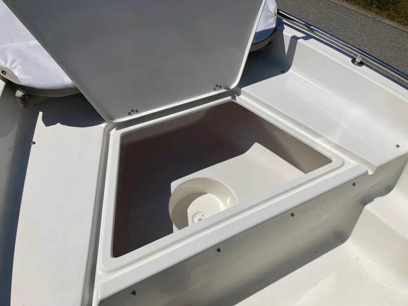 Slide: The Image of Open storage compartment on 2024 Key West 1720 Sportsman boat. - 7