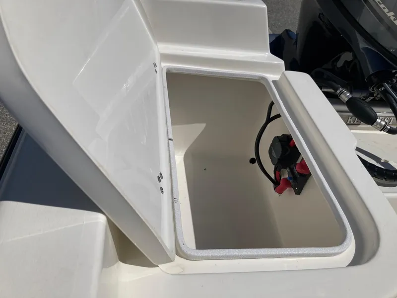 Slide: The Image of Open storage compartment on a 2024 Key West 1720 Sportsman boat. - 8