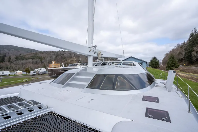 Slide: The Image of 2025 Shuttleworth 52 AeroRig yacht with sleek design and panoramic windows. - 13