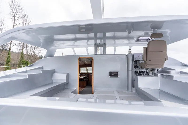 Slide: The Image of Shuttleworth 52 AeroRig 2025 yacht interior with modern helm and sleek design. - 18