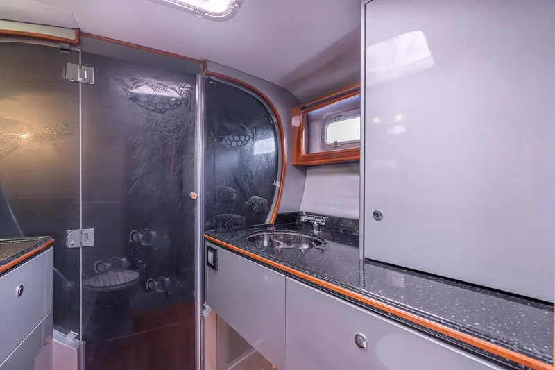 Slide: The Image of Modern bathroom interior in 2025 Shuttleworth 52 AeroRig yacht, featuring sleek design and compact layout. - 34