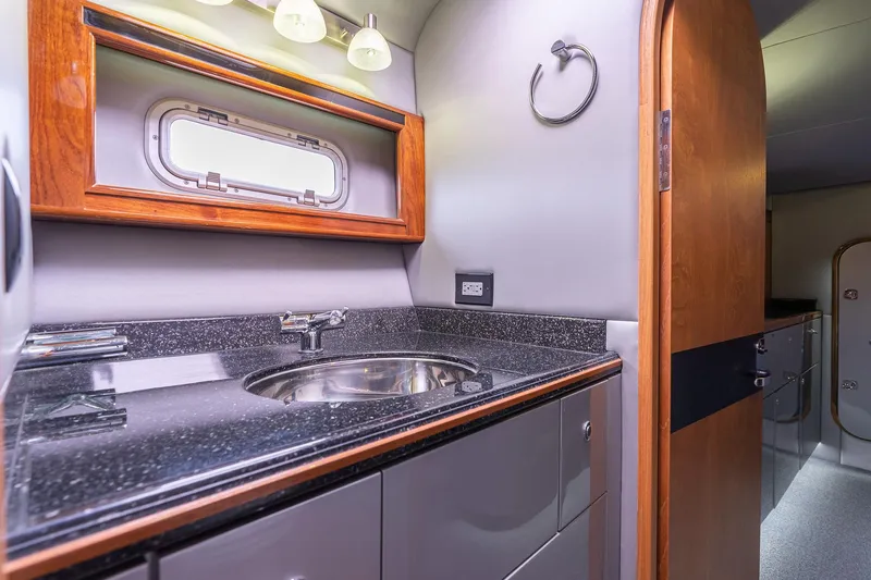 Slide: The Image of Luxurious bathroom interior of 2025 Shuttleworth 52 AeroRig yacht, featuring sleek design and modern fixtures. - 36