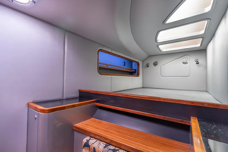 Slide: The Image of Interior of 2025 Shuttleworth 52 AeroRig yacht, featuring modern design and wooden accents. - 44