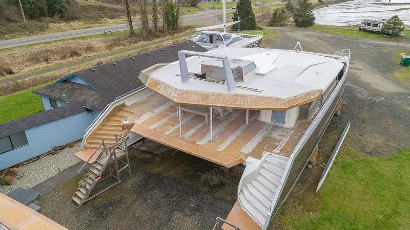 Slide: The Image of 2025 Catamaran Bloomfield 86 Motorsailor under construction, aerial view. - 11