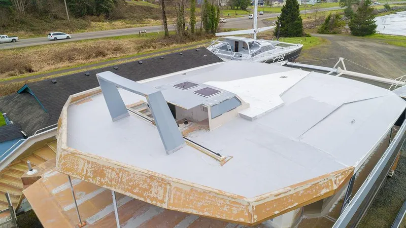 Slide: The Image of 2025 Catamaran Bloomfield 86 Motorsailor under construction, showcasing deck and structural design. - 28