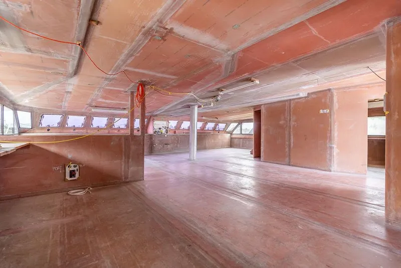 Slide: The Image of Spacious interior of 2025 Catamaran Bloomfield 86 Motorsailor under construction. - 38