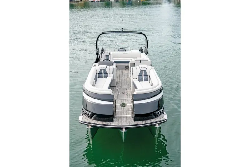 Slide: The Image of 2022 Harris Grand Mariner 250 pontoon boat on water. - 16