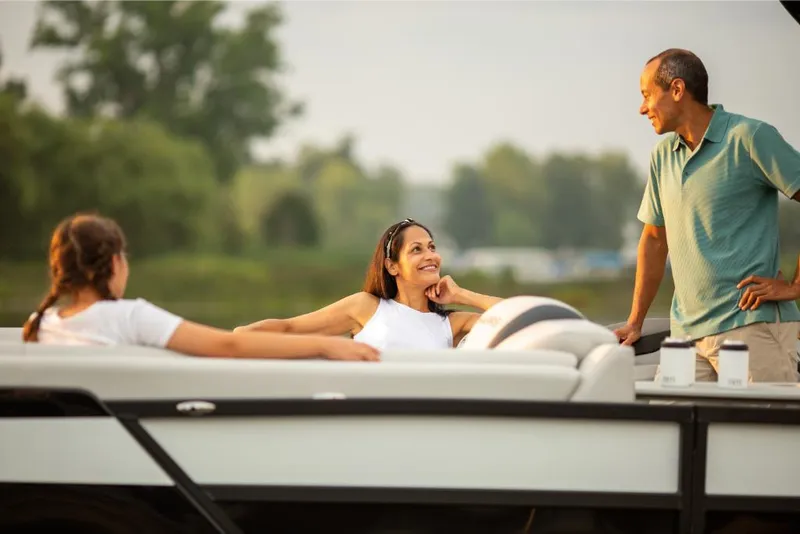 Slide: The Image of Family enjoying a day on a 2022 Harris Grand Mariner 250 boat. - 20