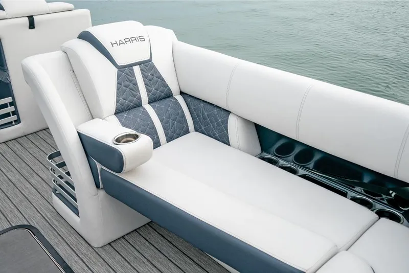 Slide: The Image of 2022 Harris Grand Mariner 250 boat interior with luxurious seating and cup holder. - 23