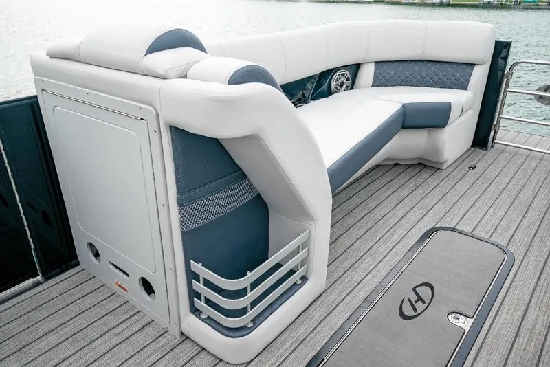 Slide: The Image of 2022 Harris Grand Mariner 250 boat interior with luxurious seating and modern design. - 9