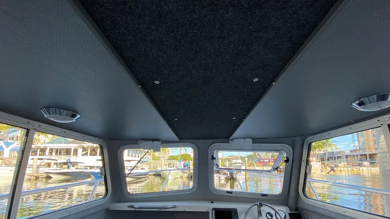 Slide: The Image of Interior view of 2024 Defiance 220 Admiral EX boat cabin. - 5