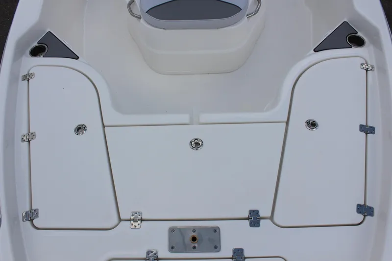 Slide: The Image of 2022 NauticStar 195 XTS boat deck with storage compartments. - 16