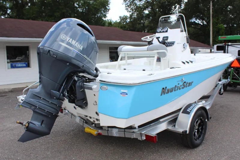 Slide: The Image of 2022 NauticStar 195 XTS boat with Yamaha outboard motor on trailer. - 6