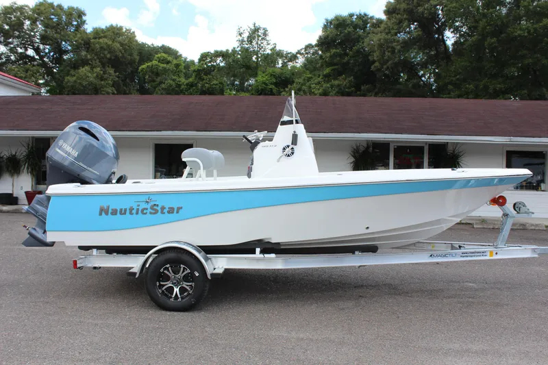 Slide: The Image of 2022 NauticStar 195 XTS boat on a trailer, side view. - 8