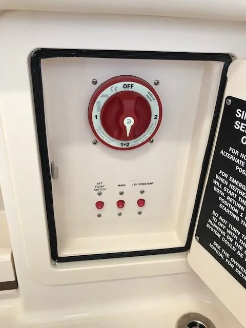 Slide: The Image of Battery switch panel on 2024 Grady-White Freedom 235 boat. - 12