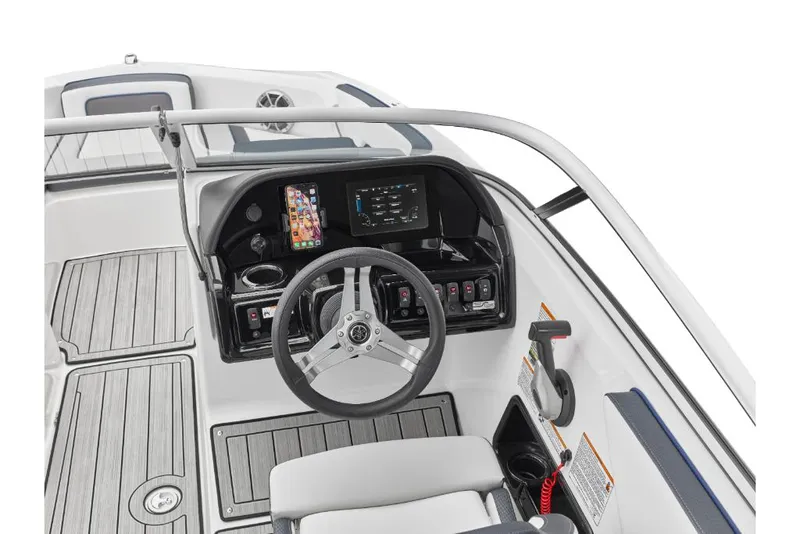 Slide: The Image of 2023 Yamaha Outboards 195S boat cockpit with steering wheel and control panel. - 16