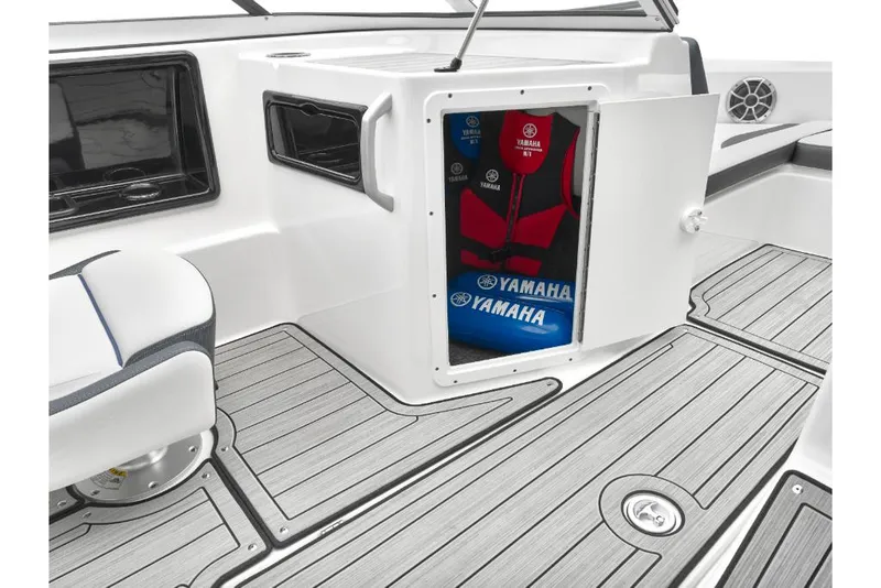 Slide: The Image of 2023 Yamaha Outboards 195S boat interior with storage compartment and life jackets. - 19