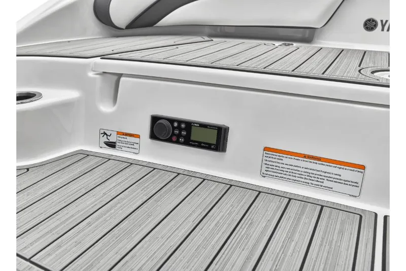 Slide: The Image of 2023 Yamaha Outboards 195S boat deck with control panel and safety warnings. - 20