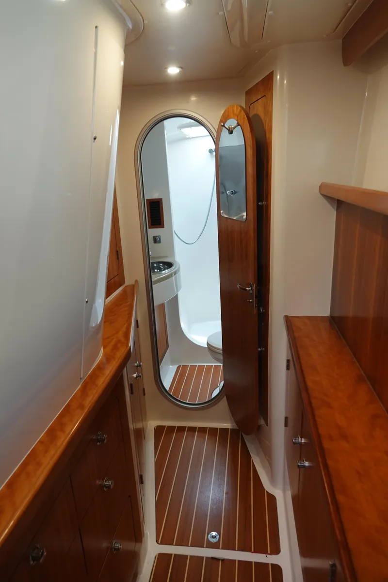 Slide: The Image of Interior of a 2007 PDQ MV-41 yacht with wooden floors and elegant design. - 11