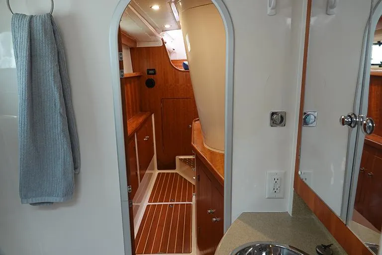 Slide: The Image of Interior of a 2007 PDQ MV-41 yacht with wood paneling. - 13