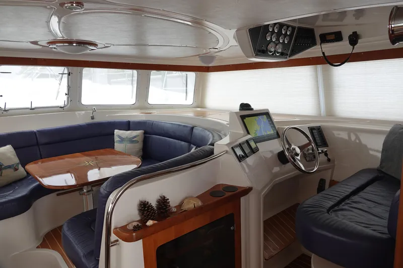 Slide: The Image of Interior of a 2007 PDQ MV-41 yacht with helm and seating area. - 2