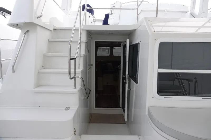 Slide: The Image of 2007 PDQ MV-41 yacht with stairs and entrance door. - 25