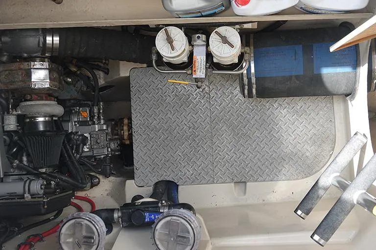 Slide: The Image of Engine compartment of a 2007 PDQ MV-41 with technical components. - 31