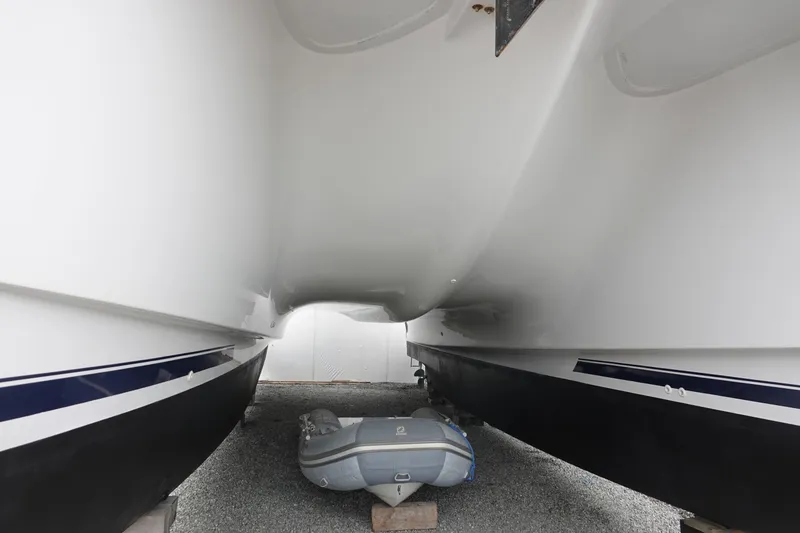 Slide: The Image of Underside of a 2007 PDQ MV-41 boat with a dinghy. - 34