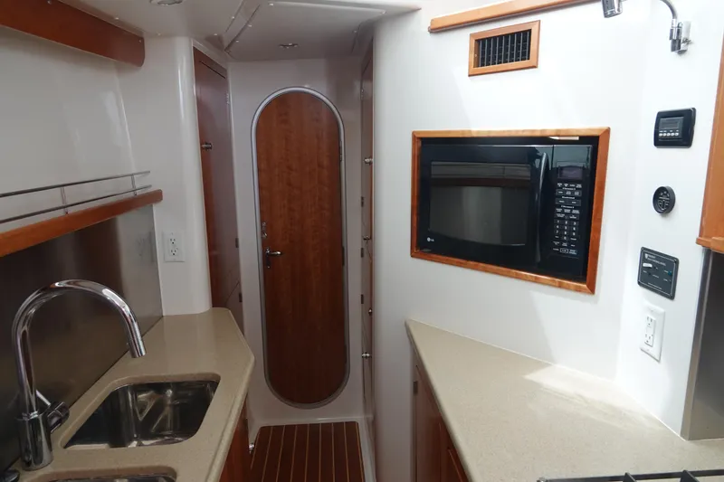 Slide: The Image of Interior of a 2007 PDQ MV-41 yacht kitchen. - 8