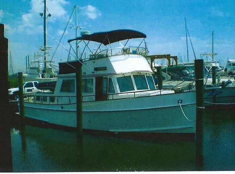 The Image of 1989 Grand Banks 42 Classic yacht docked at marina. - 0