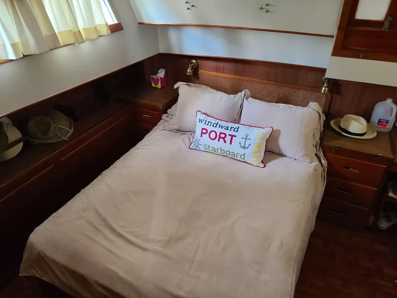 Slide: The Image of Cozy bedroom in 1989 Grand Banks 42 Classic yacht with nautical decor. - 8