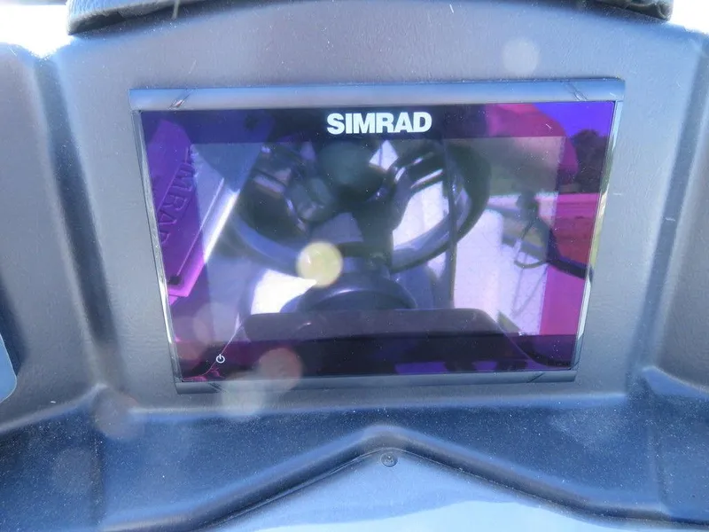 Slide: The Image of Simrad display on 2021 Coach Pontoons 245 RFC-21 boat dashboard. - 11