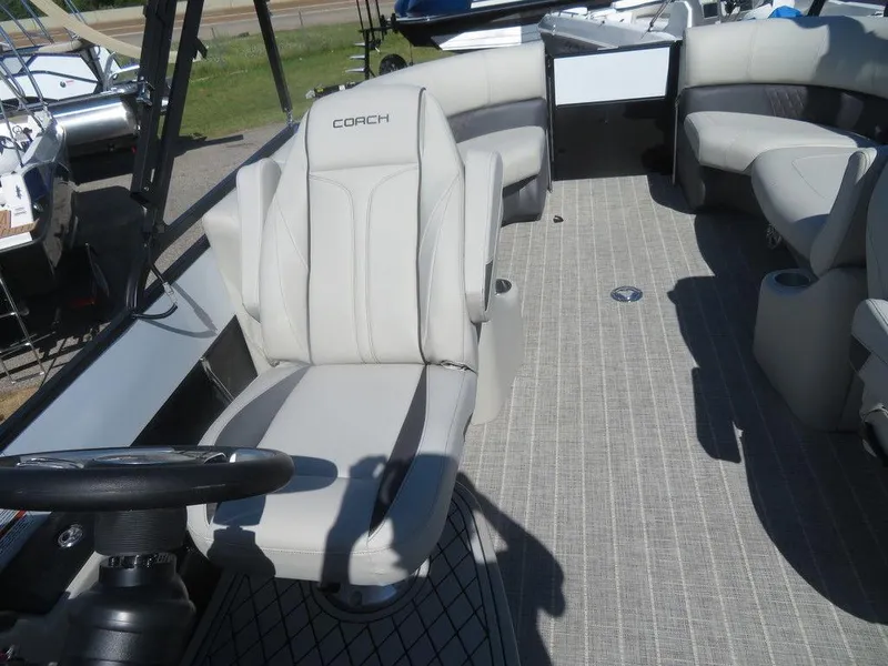 Slide: The Image of 2021 Coach Pontoons 245 RFC-21 interior with plush seating and modern design. - 12