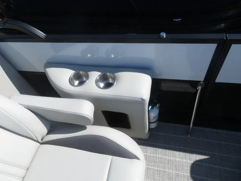Slide: The Image of 2021 Coach Pontoons 245 RFC-21 interior seating with cup holders. - 15