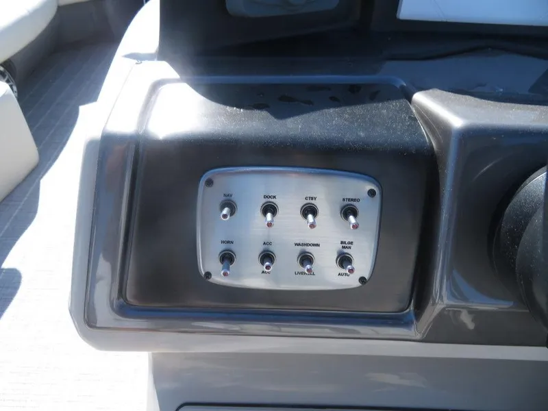 Slide: The Image of Control panel of a 2021 Coach Pontoons 245 RFC-21 boat. - 7