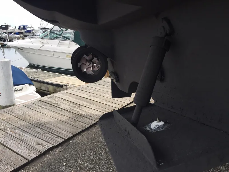 Slide: The Image of Stern view of a 2013 Meridian 341 Sedan boat docked at a marina. - 14