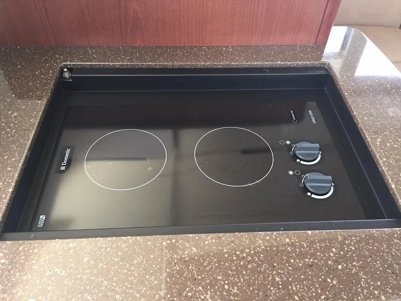 Slide: The Image of Built-in electric cooktop on 2013 Meridian 341 Sedan yacht kitchen counter. - 24