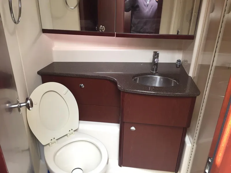 Slide: The Image of Bathroom interior of 2013 Meridian 341 Sedan yacht with sink and toilet. - 30