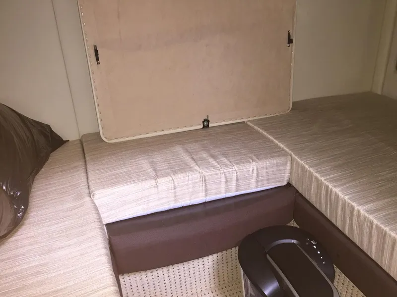 Slide: The Image of Interior cabin seating of 2013 Meridian 341 Sedan yacht with beige cushions. - 35