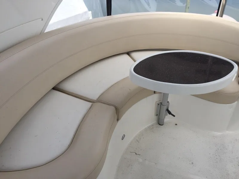 Slide: The Image of 2013 Meridian 341 Sedan interior with beige seating and small round table. - 40