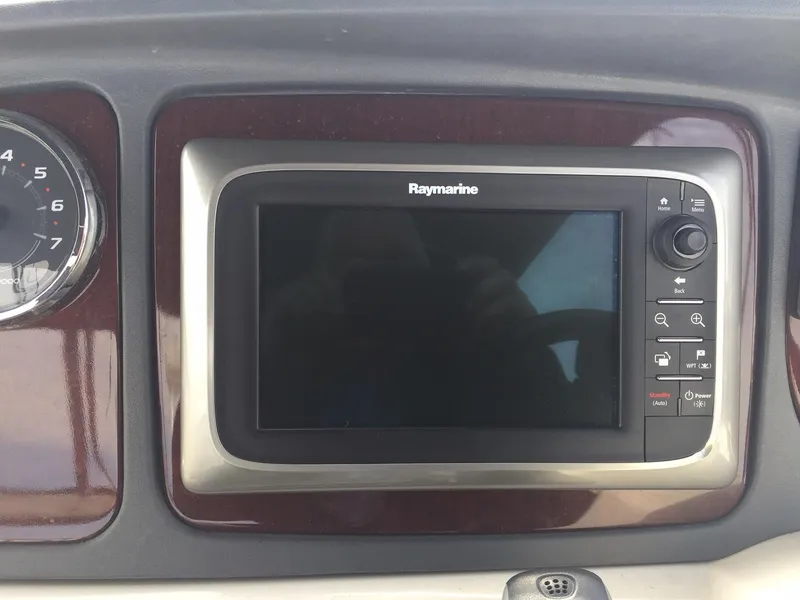 Slide: The Image of Raymarine navigation system on 2013 Meridian 341 Sedan dashboard. - 43