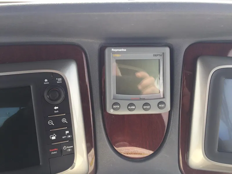 Slide: The Image of Dashboard of a 2013 Meridian 341 Sedan with Raymarine depth display. - 44