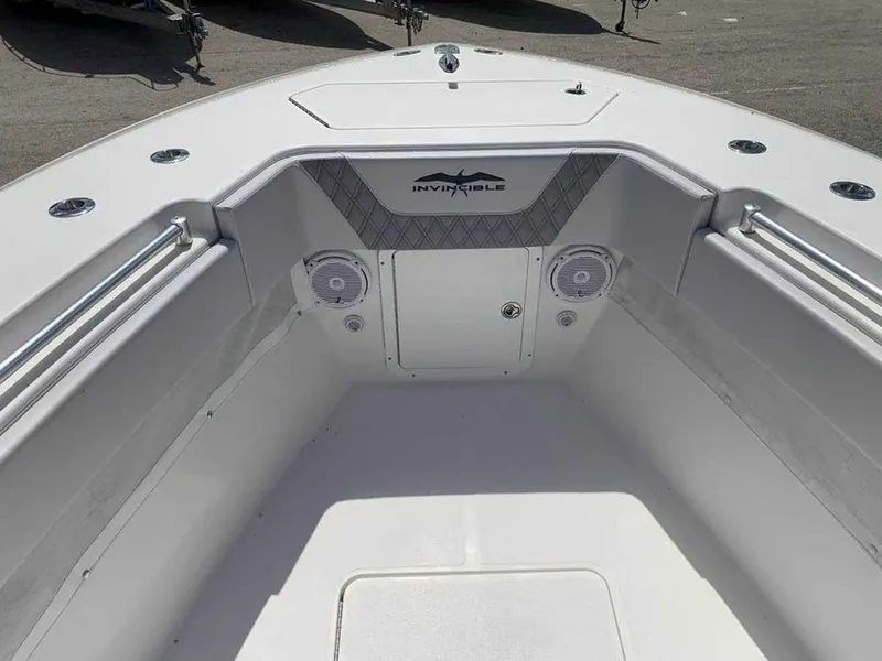 Slide: The Image of Bow of 2008 Invincible 33 boat with speakers and storage compartment. - 3