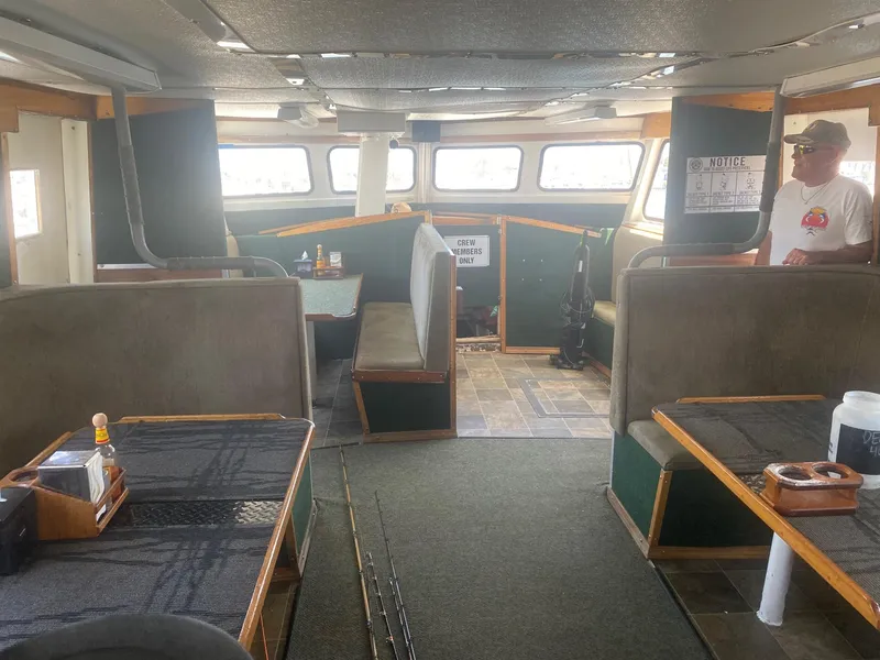 Slide: The Image of Interior of a 1945 Higgins PT boat with seating and dining area. - 8