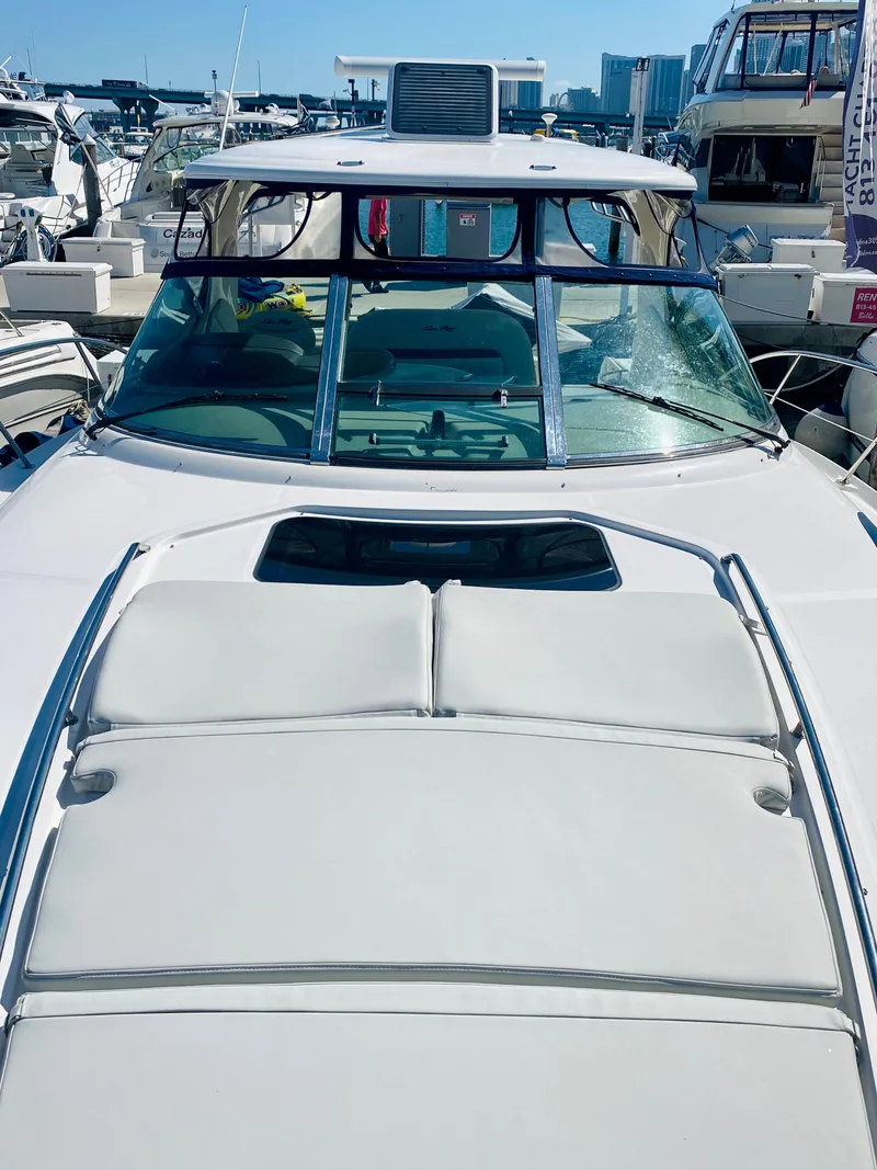 Slide: The Image of 2007 Sea Ray 44 Sundancer yacht with sunpad, docked at marina. - 12