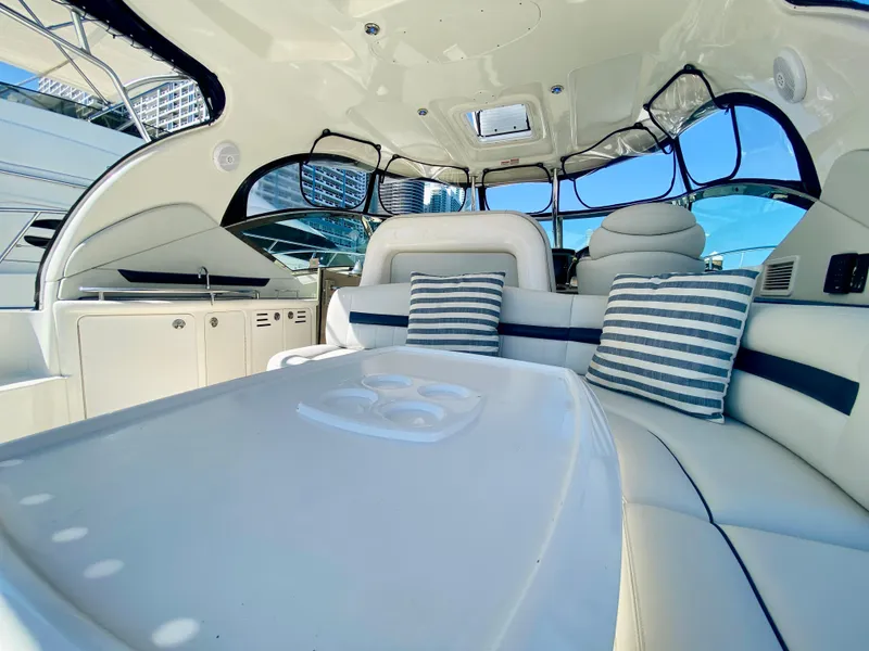 Slide: The Image of Luxurious interior of 2007 Sea Ray 44 Sundancer yacht with striped cushions. - 24