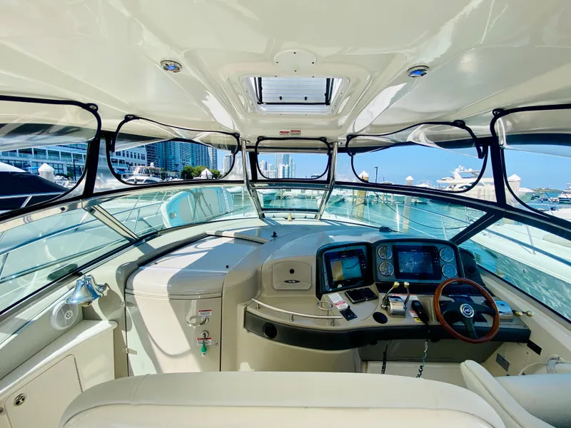 Slide: The Image of Interior helm of 2007 Sea Ray 44 Sundancer yacht with modern navigation equipment. - 29