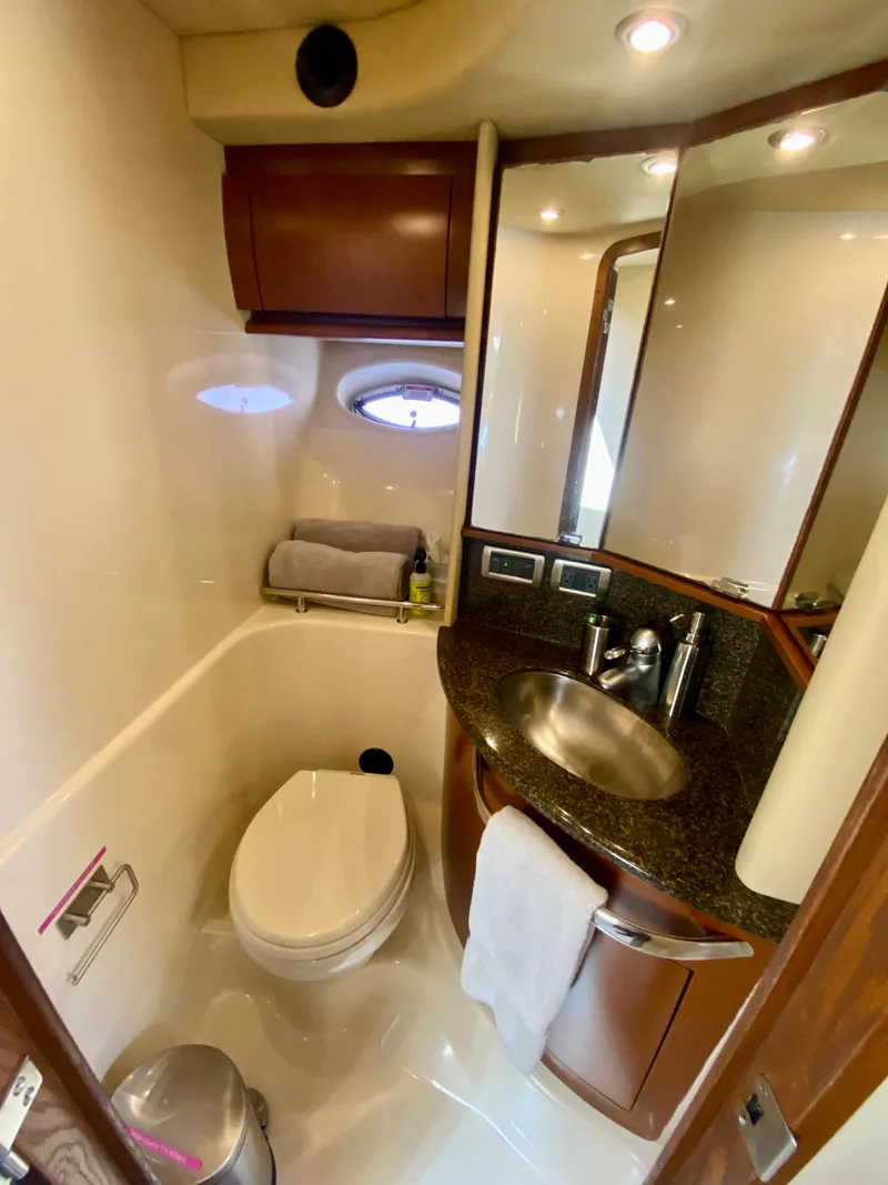 Slide: The Image of Luxurious bathroom in a 2007 Sea Ray 44 Sundancer yacht with modern fixtures. - 42
