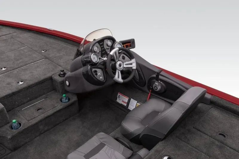 Slide: The Image of 2024 Tracker Pro Team™ 195 TXW Tournament Edition boat interior, steering console, and seating. - 17
